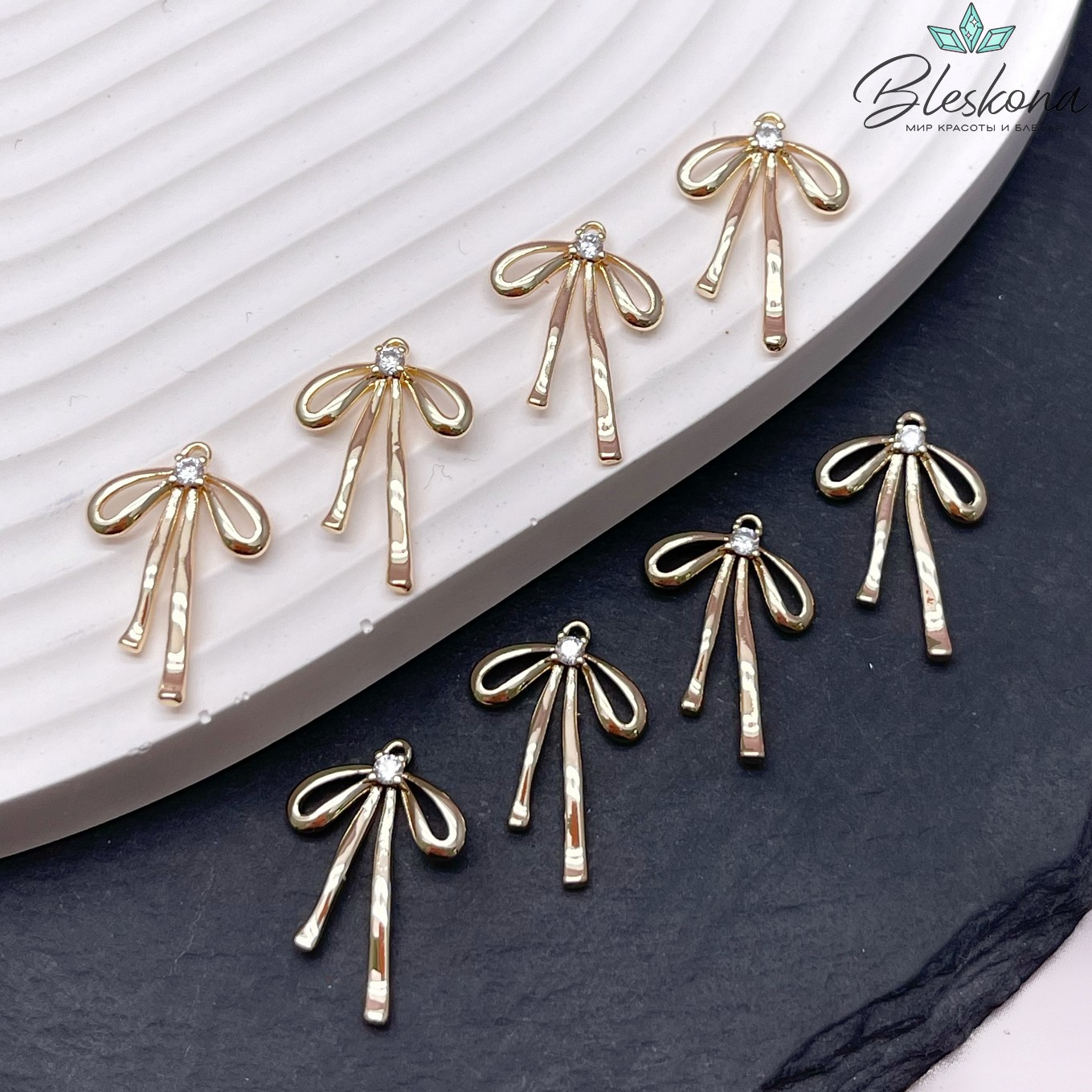 19,6*13,2 мм Цвет золото, Подвеска бантик с цирконом (справа)
