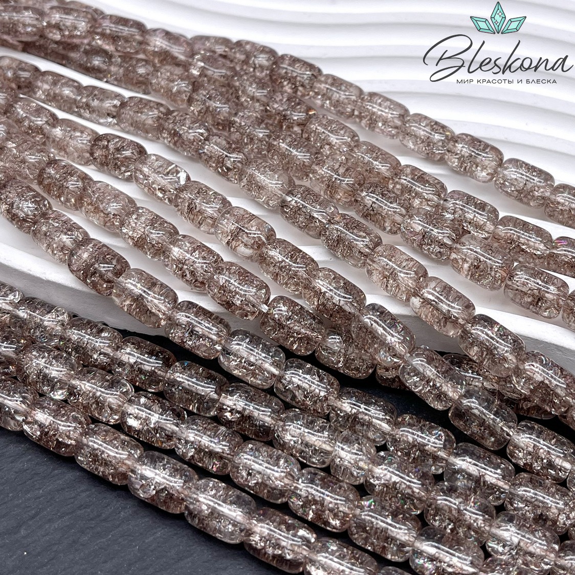 Кварц снежный коричневый бочата 11*8 мм