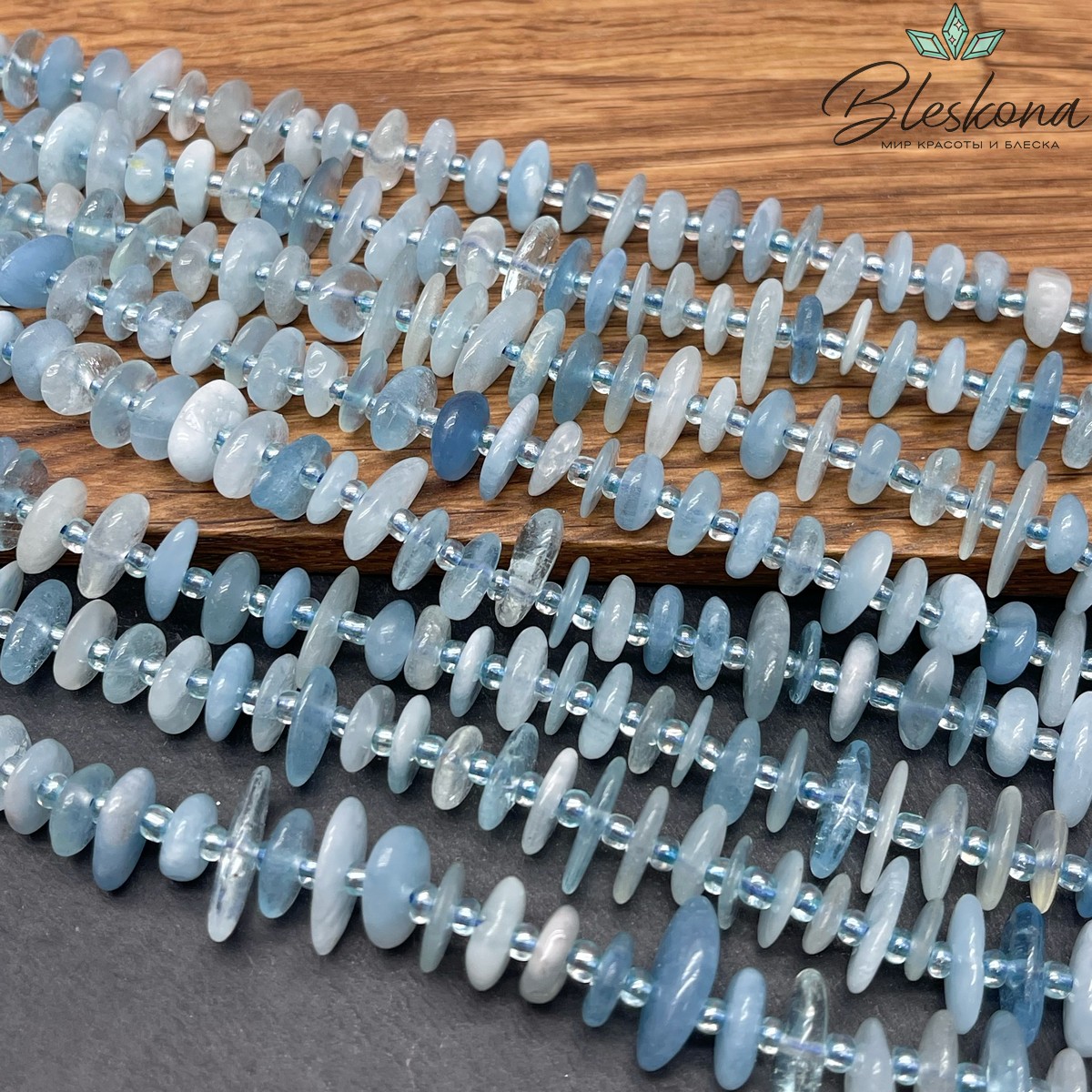 Аквамарин сколы шлифованные (2-4)*(6-13) мм 