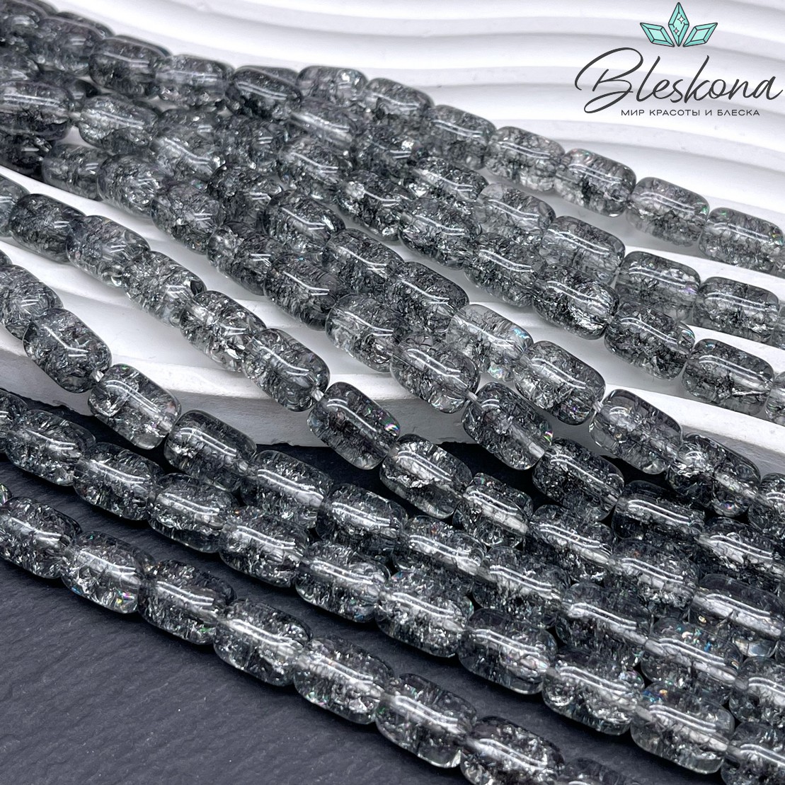 Кварц снежный серый бочата 11*8 мм