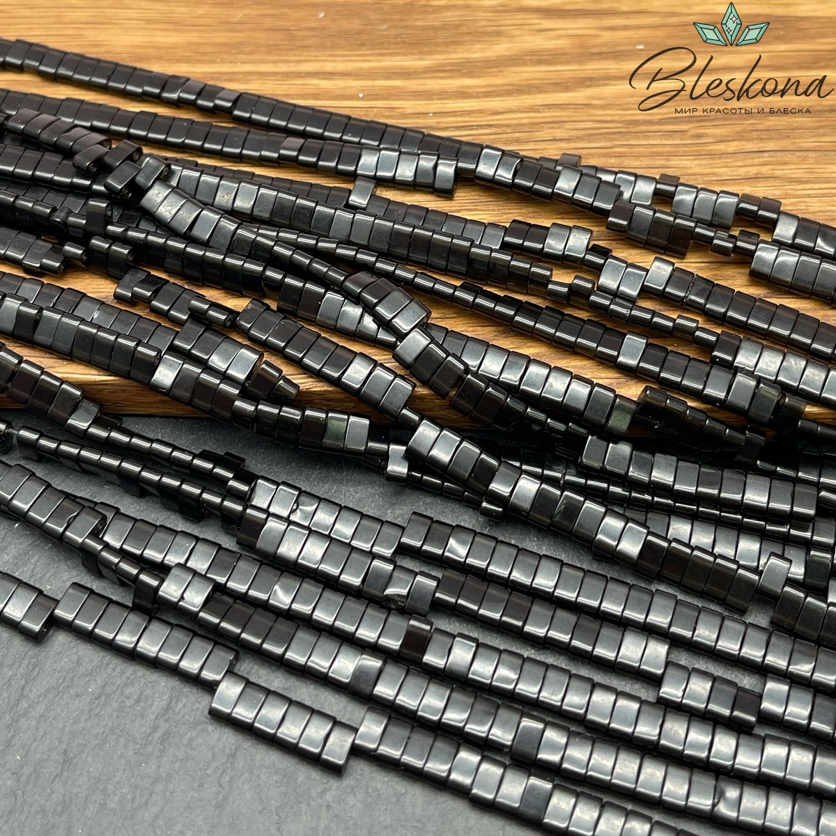 Стекло черное бусины с двумя отверстиями 2,7*5,2 мм