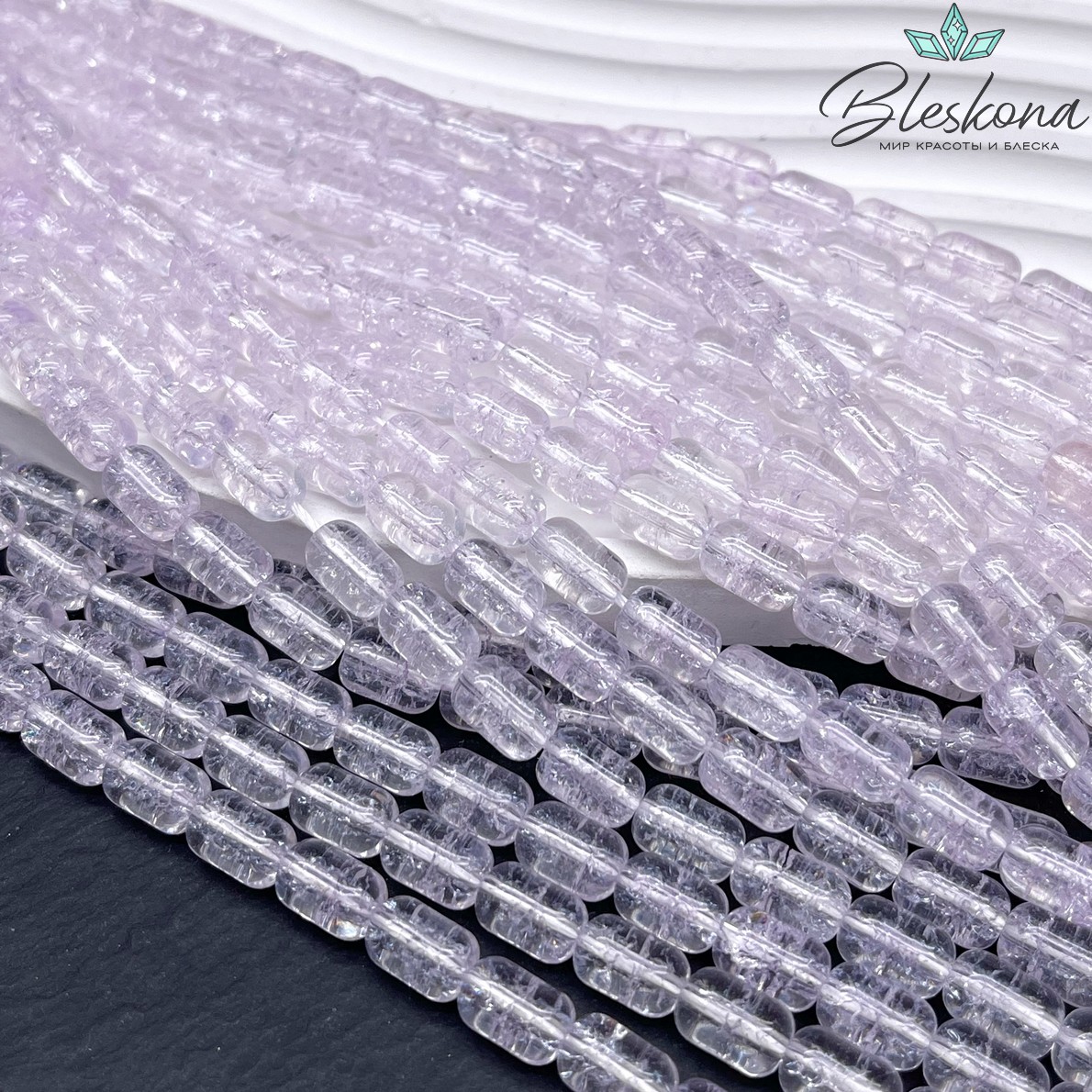 Кварц снежный светло-фиолетовый бочата 9*6 мм
