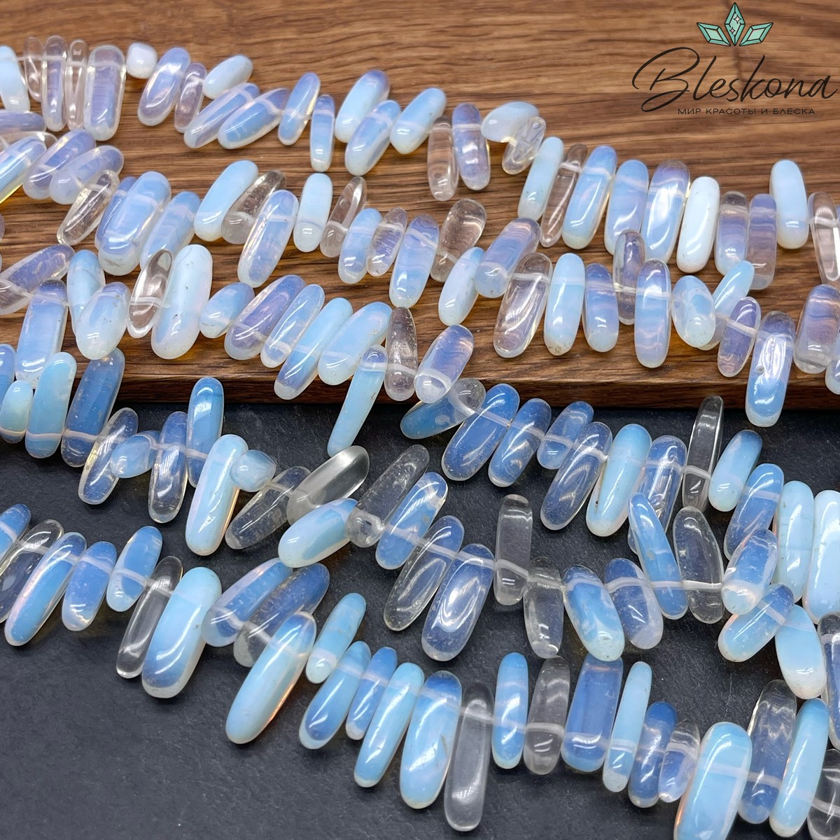 Лунный камень сколы шлифованные 10-22 мм