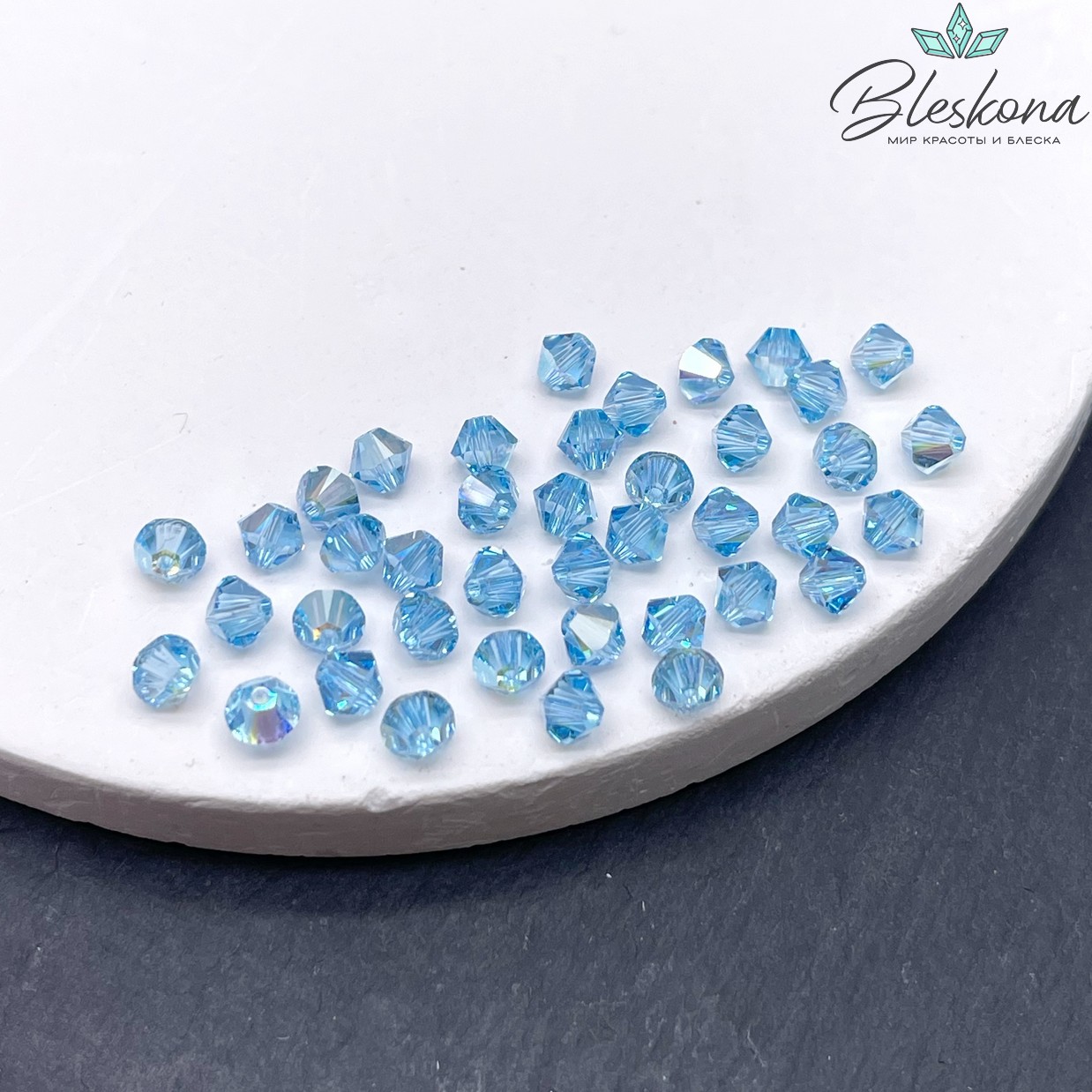 5328 Xilion Bicone 4 mm Aquamarine Aurore Boreale уп. 20шт