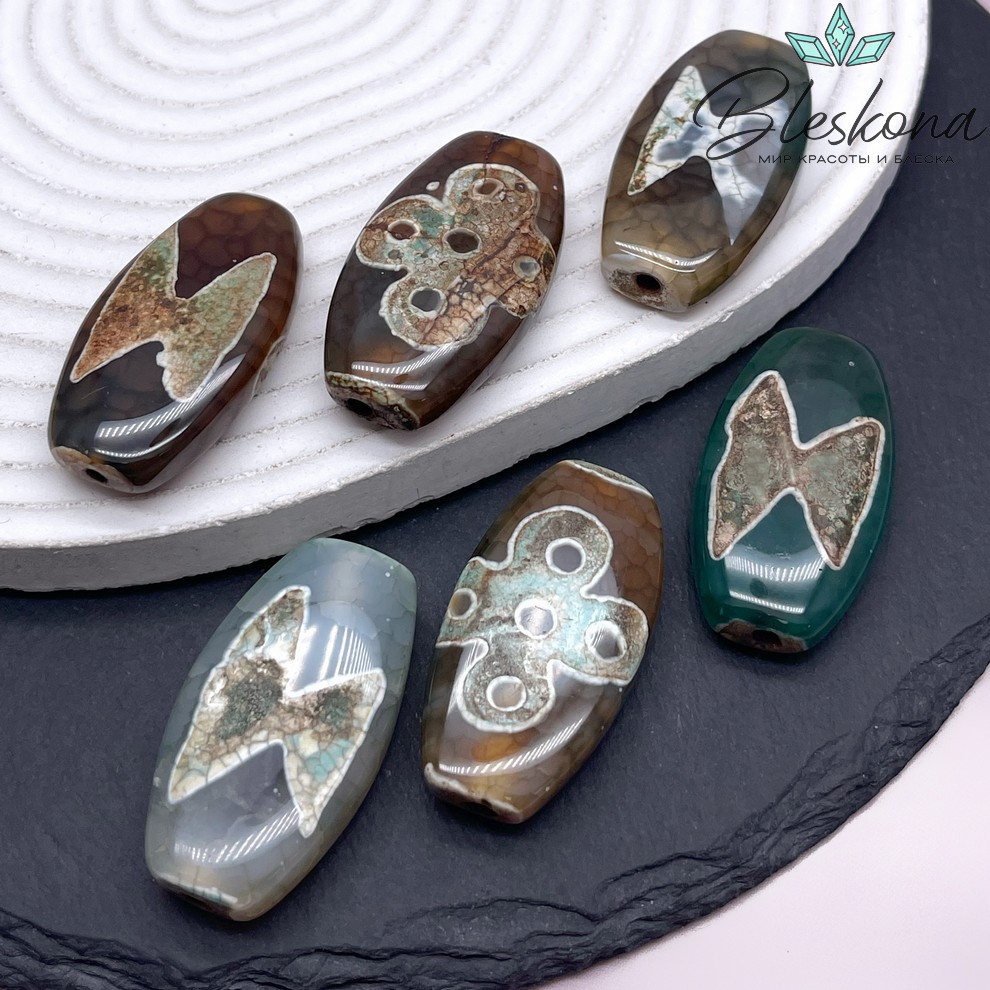 Бусина Дзи Молния и мистический узел зелено-коричневая 39*20 мм