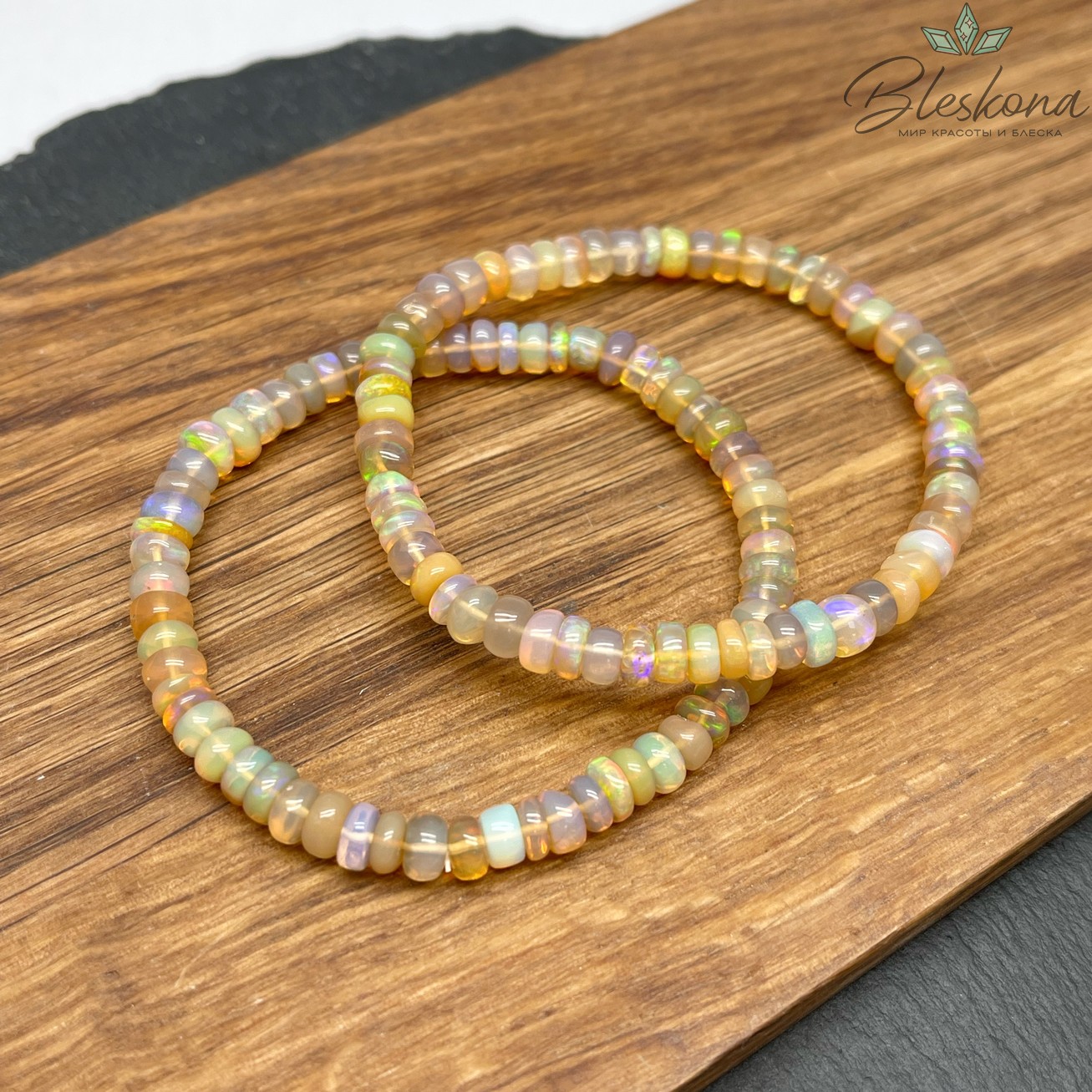 Опал Эфиопский с радужным переливом №1 5,5 мм сет 17 см