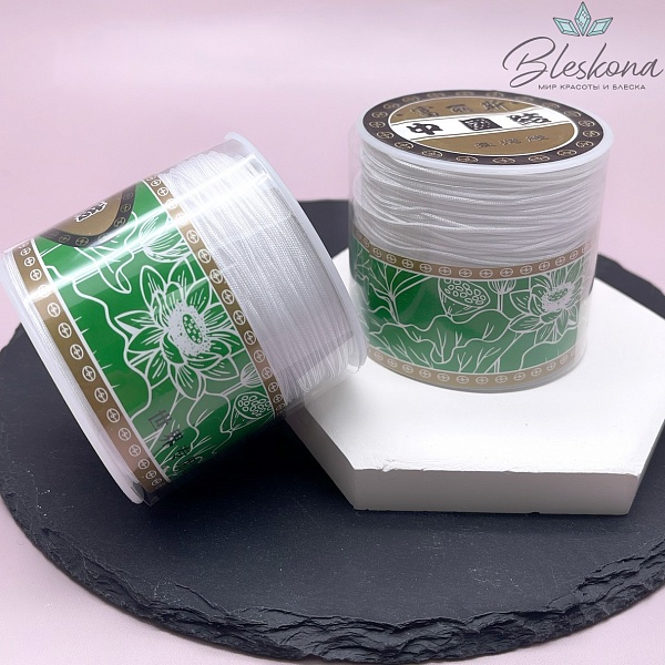 Белая  нить катушка 