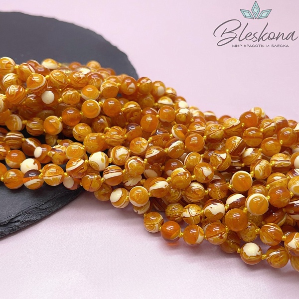 Янтарь шар оранжевый с белыми включениями