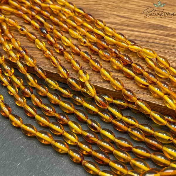 Янтарь светло-коричневый рис 10*6 мм