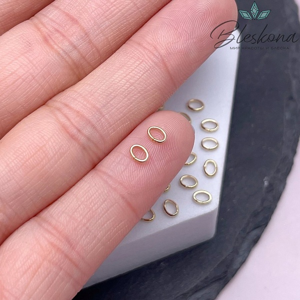 4*3*1 мм Цвет золото, Колечки овал уп. 1 гр.