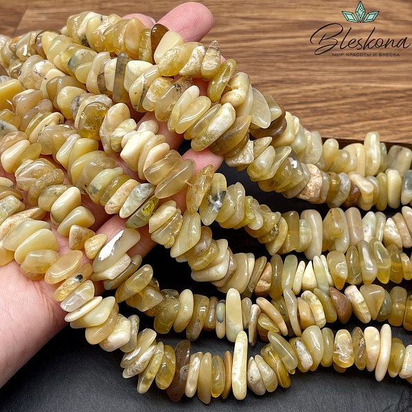 Опал желтый сколы шлифованные (3-7)*(10-16) мм