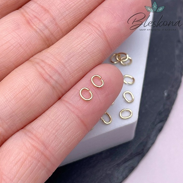 4,5*3,5*0,7 мм Цвет золото, Колечки овал уп. 1 гр.