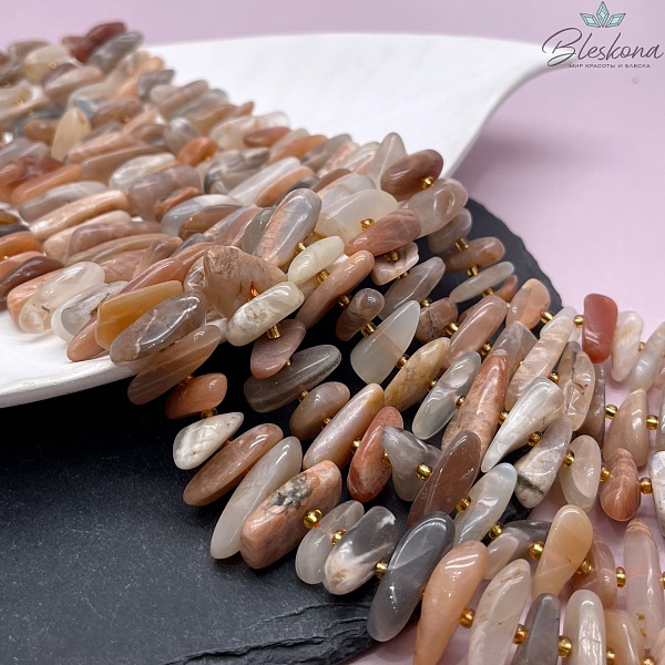 Солнечный камень сколы шлифованные 17-27 мм