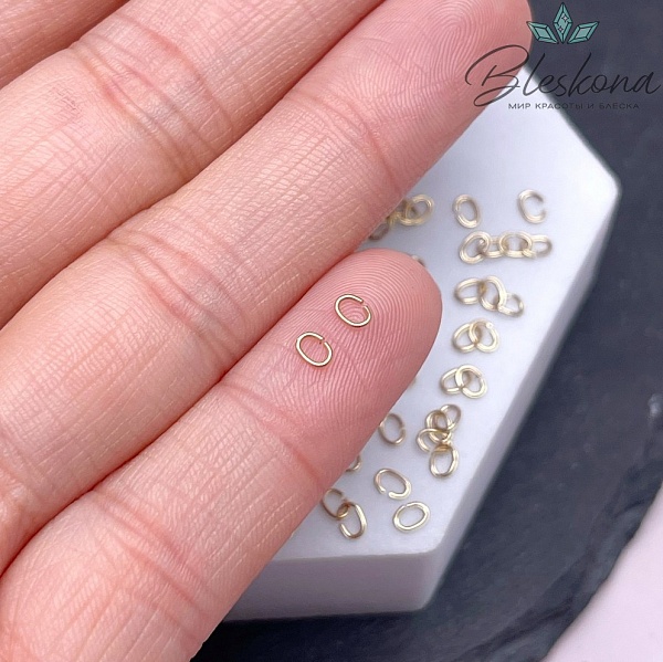 3,5*2,5*0,45 мм Цвет золото, Колечки овал уп. 1 гр.
