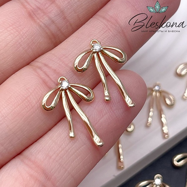 19,6*13,2 мм Цвет золото, Подвеска бантик с цирконом (справа)