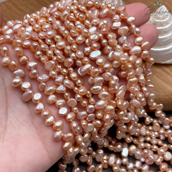 Жемчуг барочный рис персиковый смещенный центр 6-7 мм